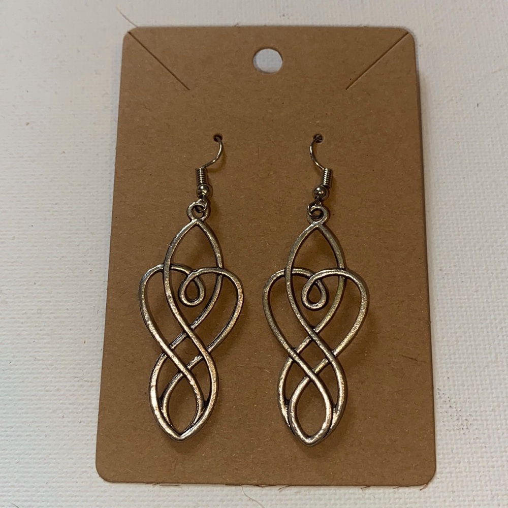 silver earring with beautiful twisted details